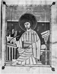 PLATE XIV

A SCRIBE AND HIS TOOLS