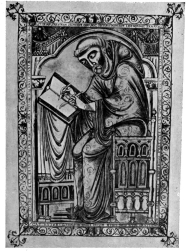 PLATE XXXII

A SCRIBE AT WORK