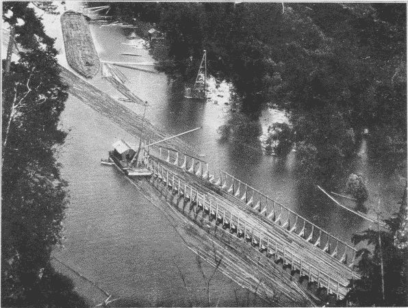 Fig. 30. Giant Raft. In the background is a completed raft; in the foreground a cradle in which a raft is being built.