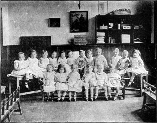 "IN THE SCHOOLROOM." From a Photo. by Elliott & Fry.