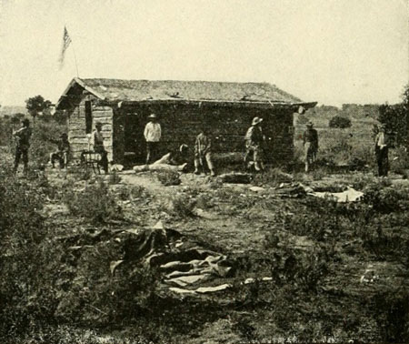 Men of the 1871
Expedition of an Abandoned Cabin Opposite the Mouth of the Uinta River.