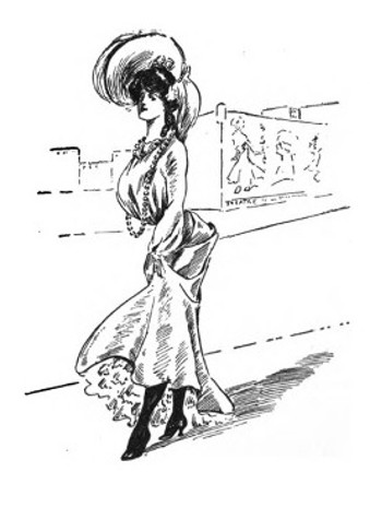 nice-looking, well-dressed woman walking down the street