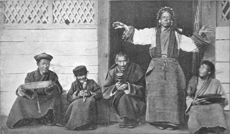 Buddhist Priest Preaching at the Door of a Temple